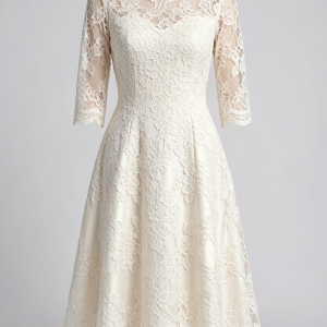 A romantic A-line evening dress in ivory French Chantilly lace over silk satin. Three-quarter sheer sleeves and a bateau