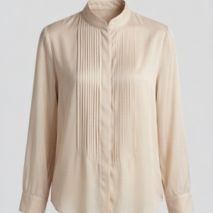 An ivory high-neck blouse with delicate cotton lace detailing, pintuck pleats, and leg-of-mutton sleeves. A romantic pie