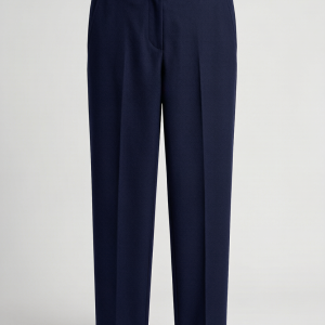 Architectural wide-leg trousers in super-120s virgin wool with front knife pleats. The high waist and floor-grazing hem