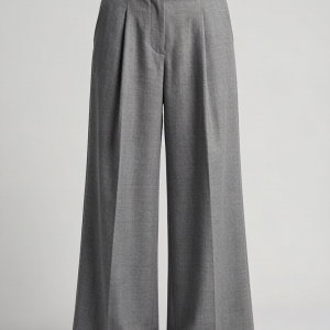 An easy A-line wrap skirt in lustrous duchess satin. The self-tie waist adjusts to your body, and the midi length makes
